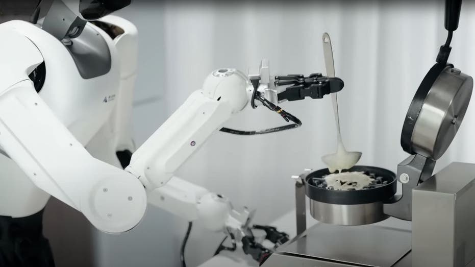 Chinese Robo Helper Can Clean, Cook, Even Shoot Hoops